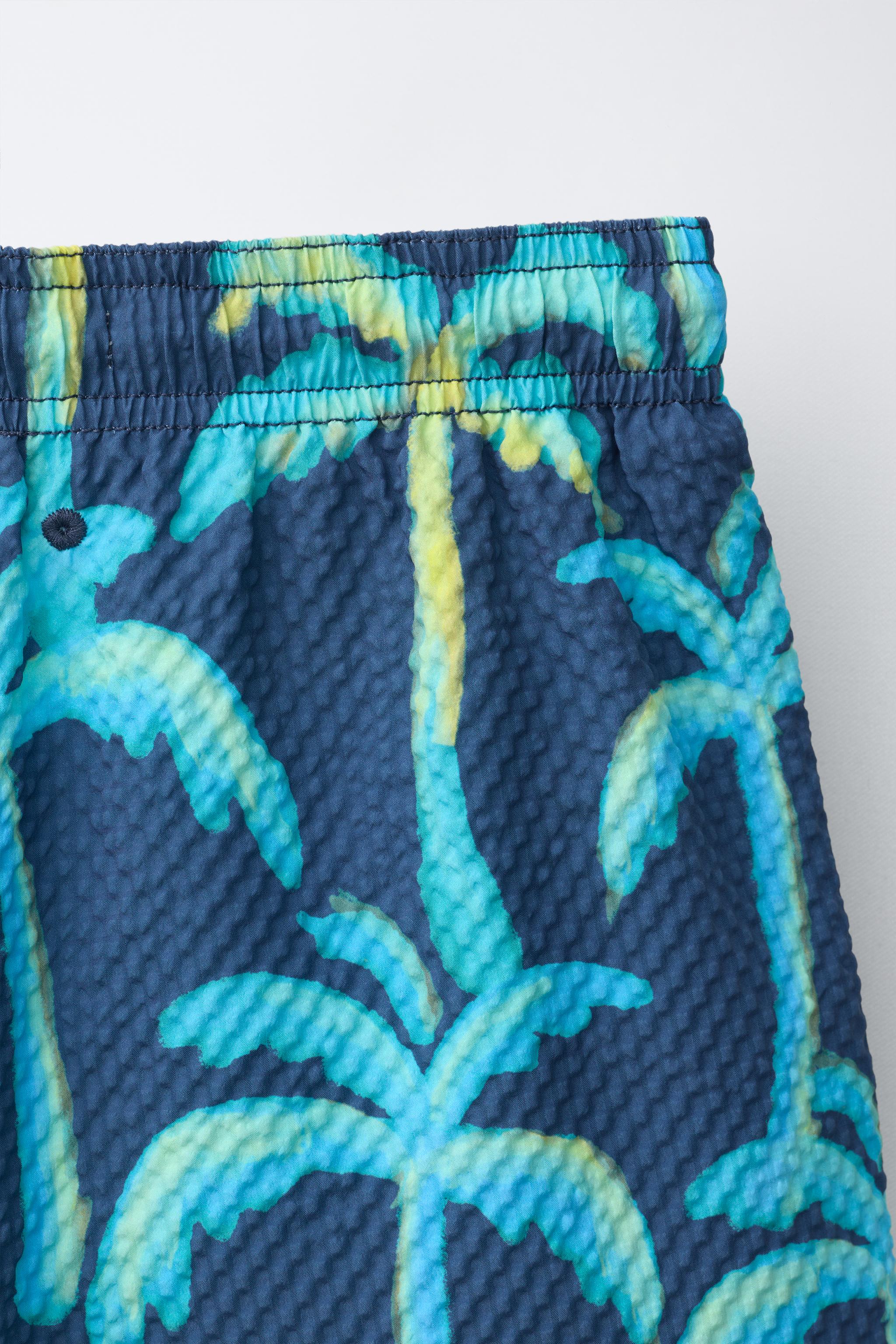 6-14 YEARS/ PALM TREE SWIM SHORTS